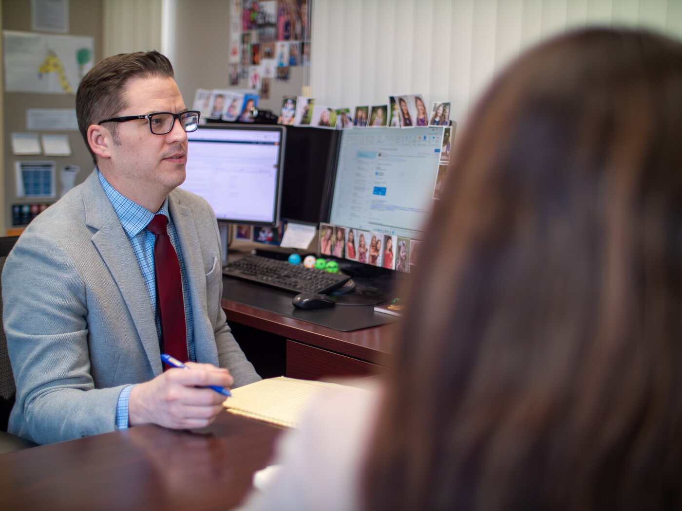 A Qualigence practice leader guiding a client through a retained search
